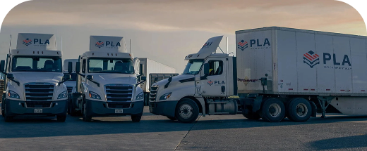 PLA trucks parked outside